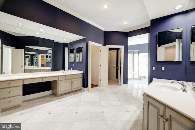 bathroom featuring crown molding and vanity