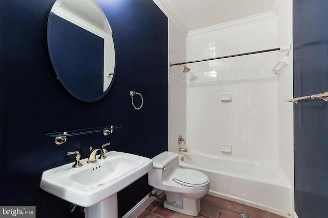 full bathroom with tile patterned flooring, toilet, ornamental molding, sink, and tiled shower / bath