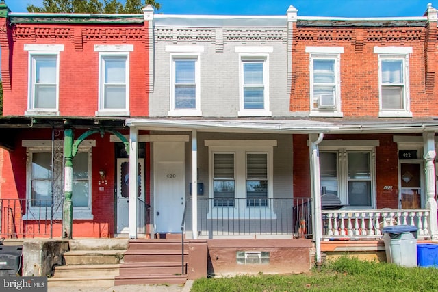 multi unit property featuring covered porch