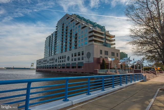 view of property with a water view