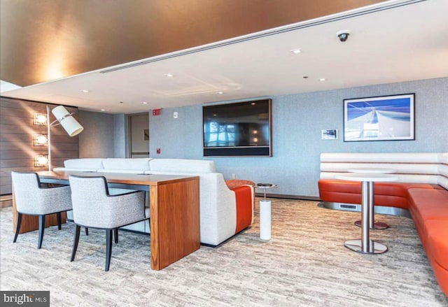 bar featuring light hardwood / wood-style flooring