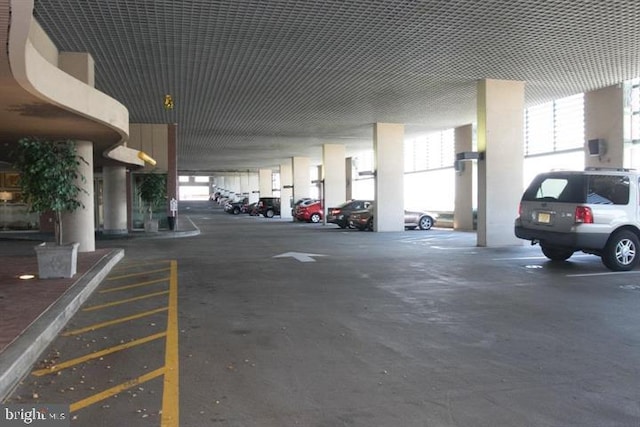 garage featuring a carport