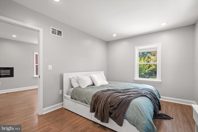 bedroom featuring hardwood / wood-style flooring