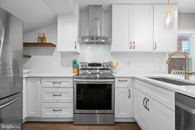 kitchen with dark hardwood / wood-style floors, appliances with stainless steel finishes, wall chimney range hood, and sink