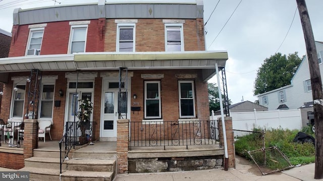 multi unit property featuring covered porch