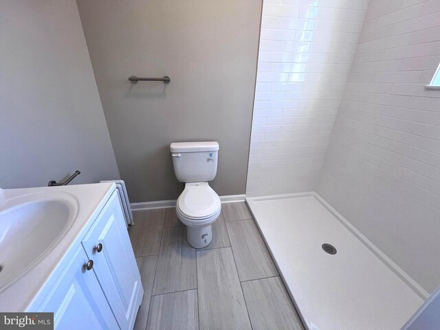 washroom featuring dark hardwood / wood-style floors and washer hookup