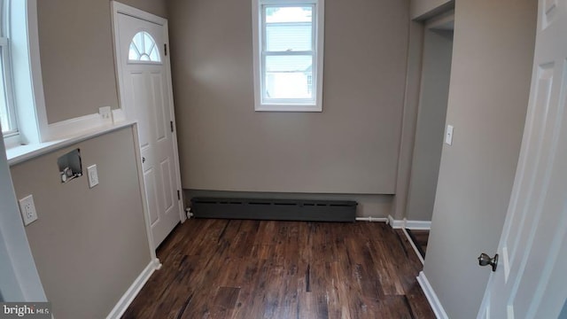 entryway with a baseboard radiator and dark hardwood / wood-style floors