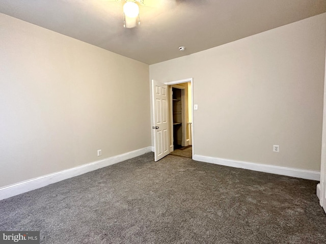 unfurnished bedroom with carpet floors and ceiling fan