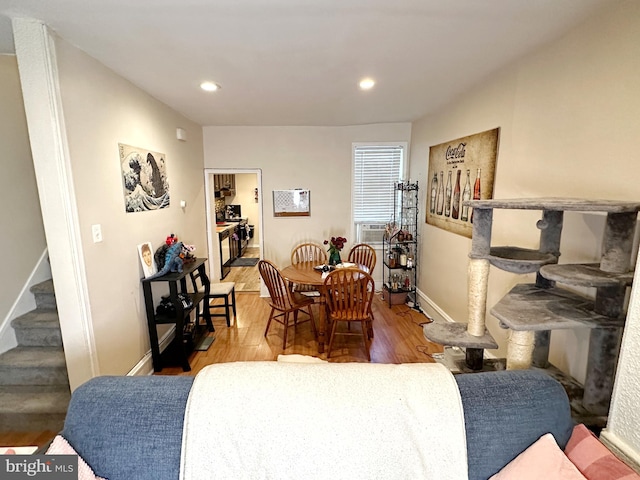 dining space featuring hardwood / wood-style floors