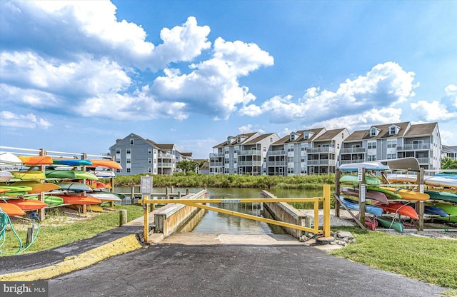 view of property's community featuring a water view