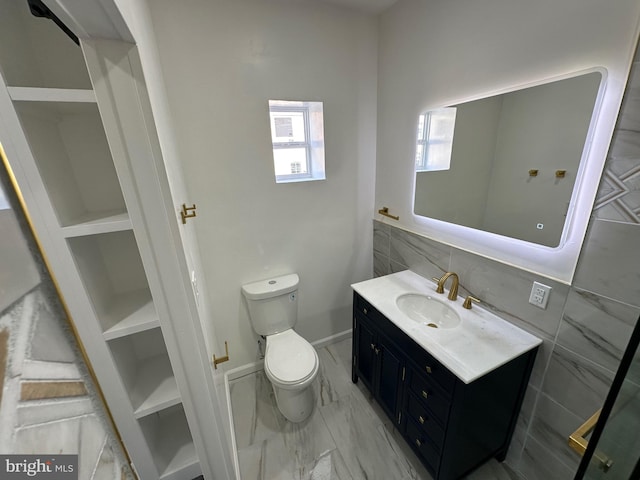 bathroom with tile patterned floors, vanity, decorative backsplash, and toilet