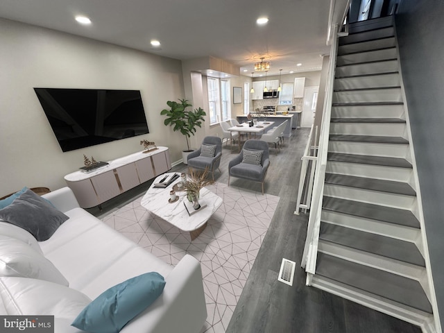 living room with light hardwood / wood-style flooring