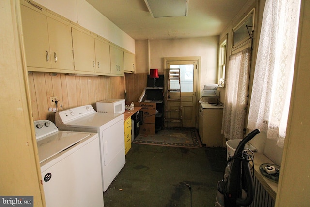 laundry room with washer and dryer