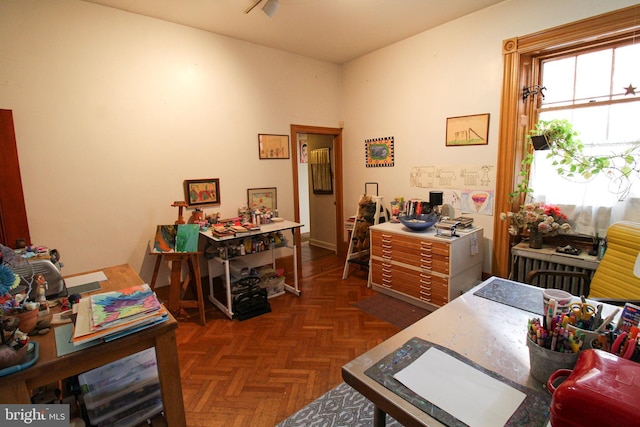 office area with dark parquet floors