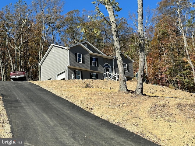 view of front of property featuring a garage