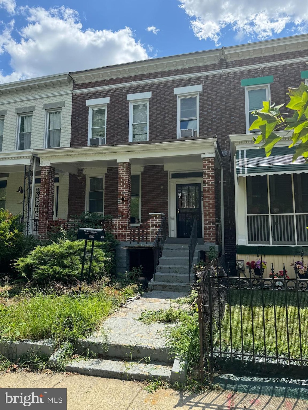 multi unit property featuring covered porch