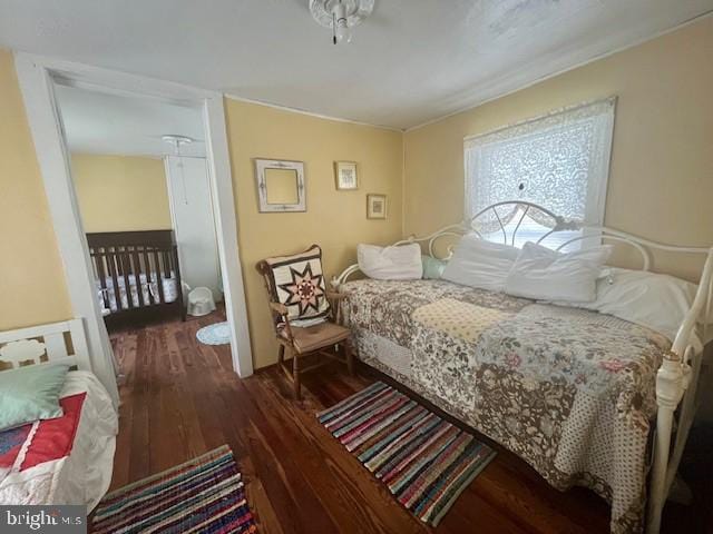 bedroom featuring wood finished floors