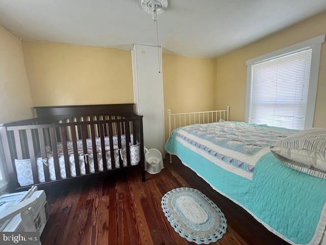 bedroom featuring wood finished floors