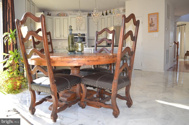 dining room featuring an inviting chandelier