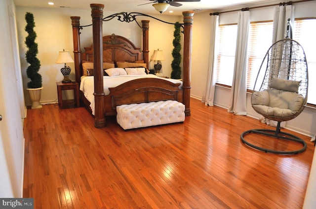 bedroom with wood-type flooring