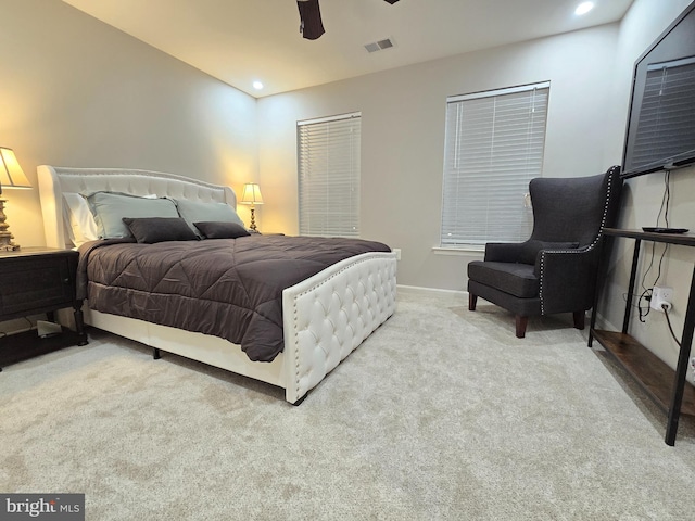 carpeted bedroom with ceiling fan