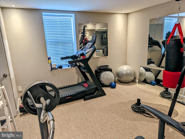 workout area featuring carpet floors and recessed lighting