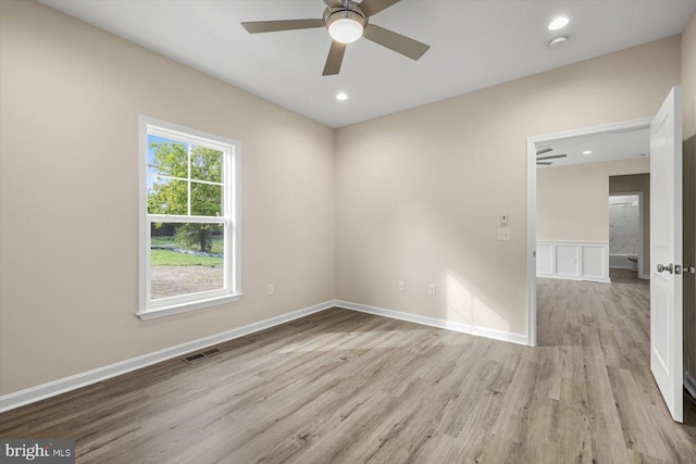 unfurnished room with visible vents, baseboards, a ceiling fan, light wood-style floors, and recessed lighting