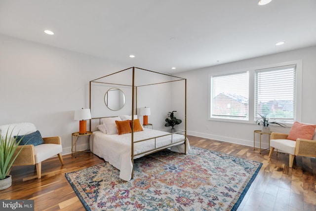 bedroom featuring wood-type flooring