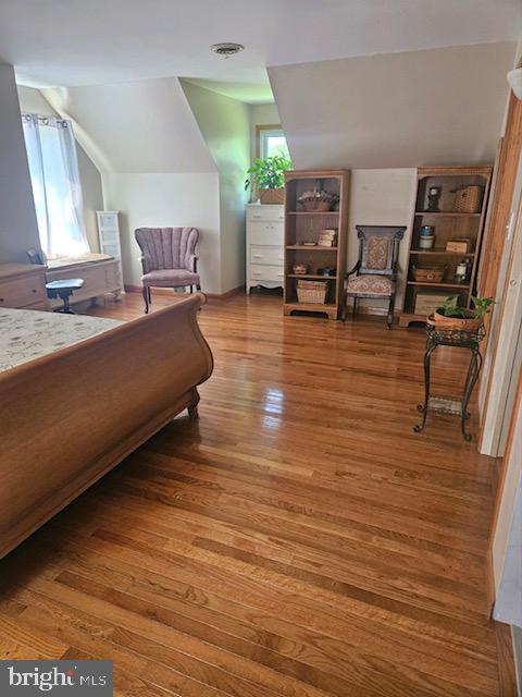 bedroom featuring hardwood / wood-style floors