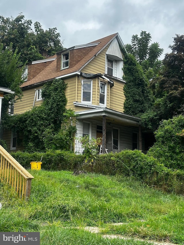 view of front of house with covered porch