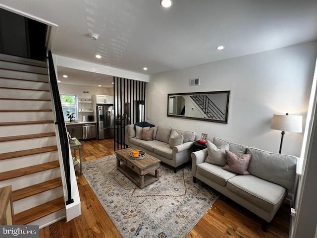 living room featuring wood-type flooring