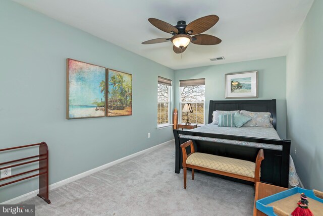 bedroom with ceiling fan and carpet flooring