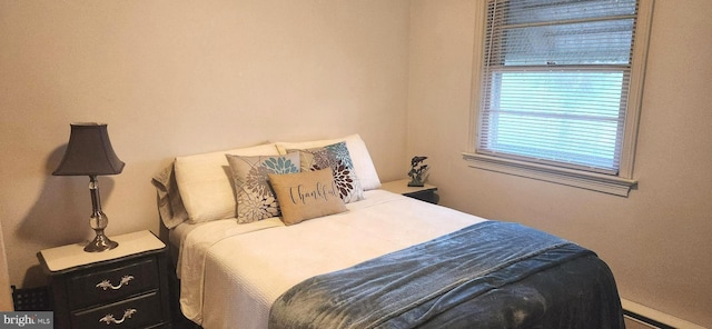 bedroom with a baseboard radiator