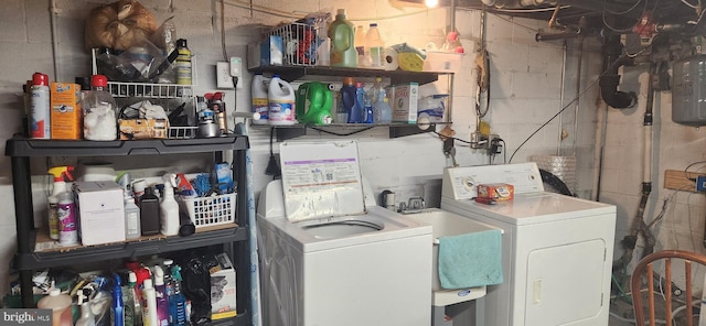 washroom featuring washing machine and dryer