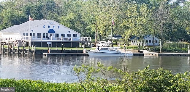 property view of water with a dock