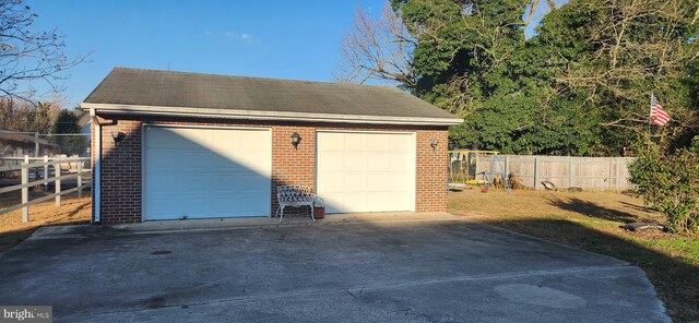 detached garage with fence