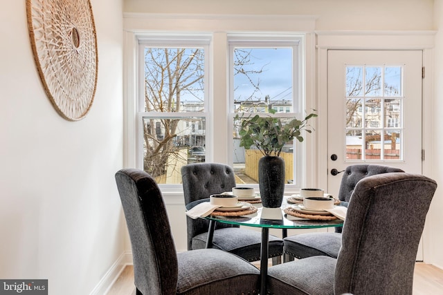 dining area featuring light wood-type flooring