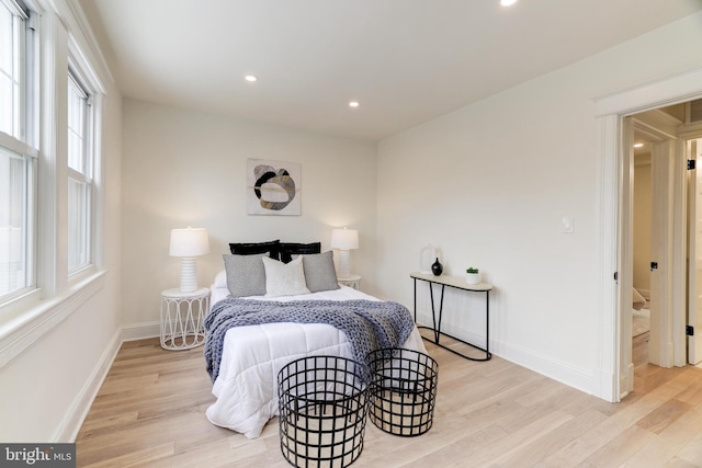 bedroom featuring light hardwood / wood-style floors