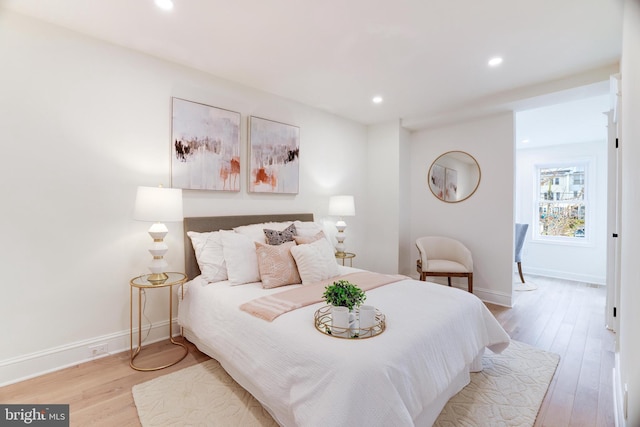 bedroom with light wood-type flooring