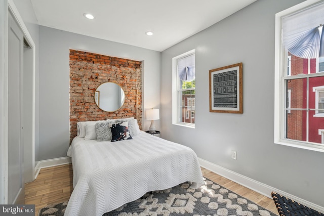 bedroom featuring light wood-type flooring