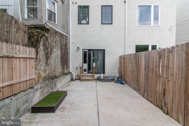 back of house featuring a patio