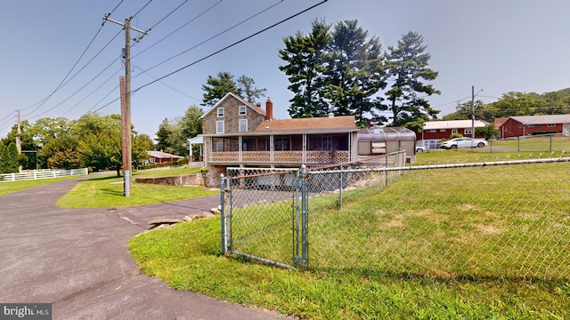 view of front of home with a front yard