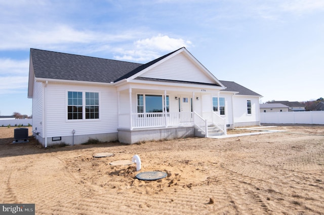 view of front of house with a porch and cooling unit