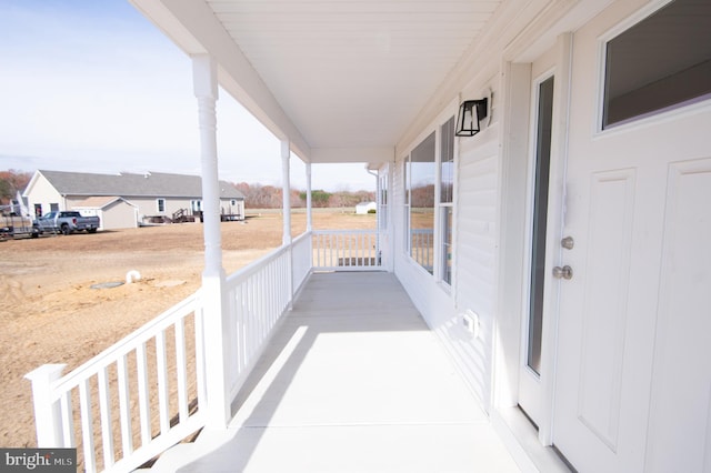 balcony featuring a porch