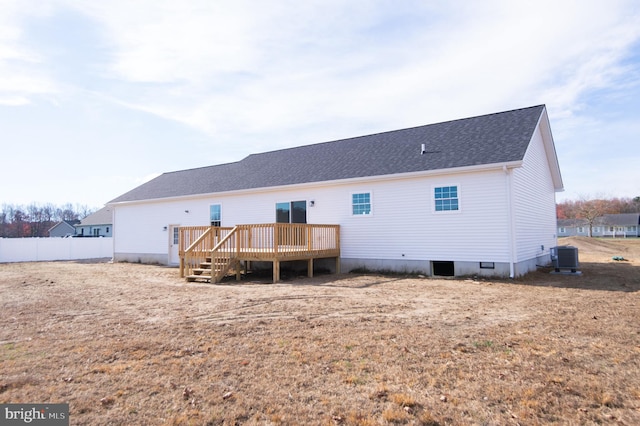 back of property featuring a wooden deck and cooling unit