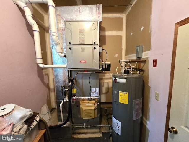 utility room featuring water heater