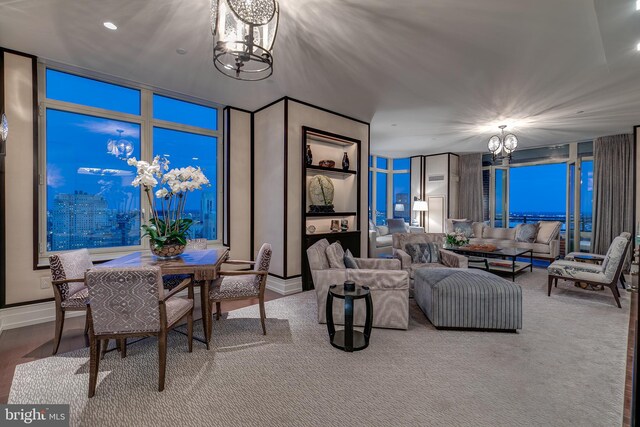 living room with an inviting chandelier