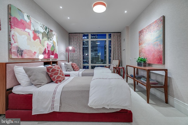 carpeted bedroom with recessed lighting