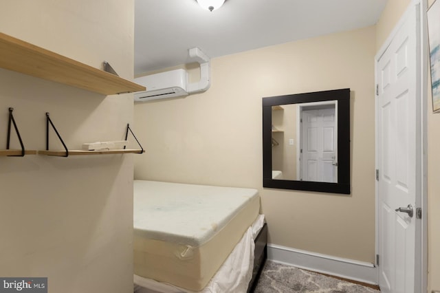 mudroom featuring carpet flooring and a wall unit AC