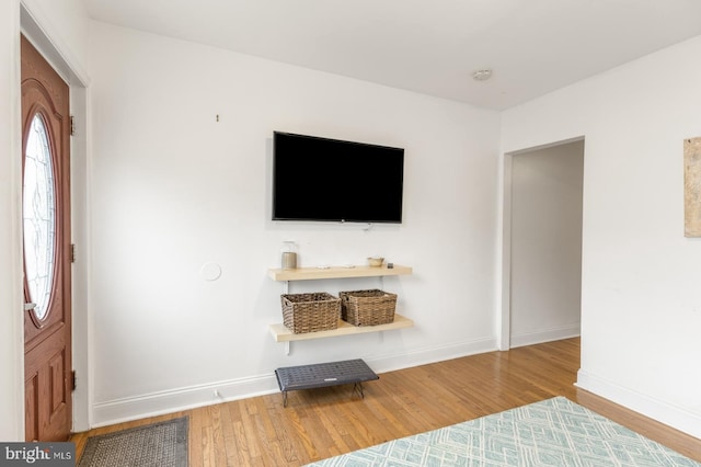 unfurnished living room featuring light hardwood / wood-style floors